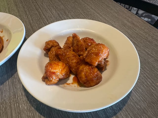 Hand Breaded Boneless Wings.