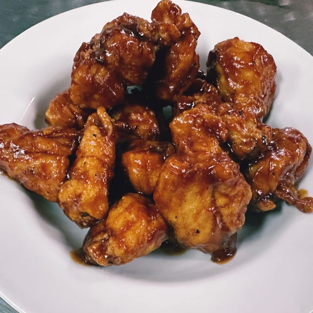 Hand Breaded Boneless Wings.