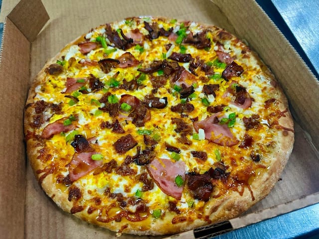 Breakfast Pizza 1/2 OFF TUESDAYS.